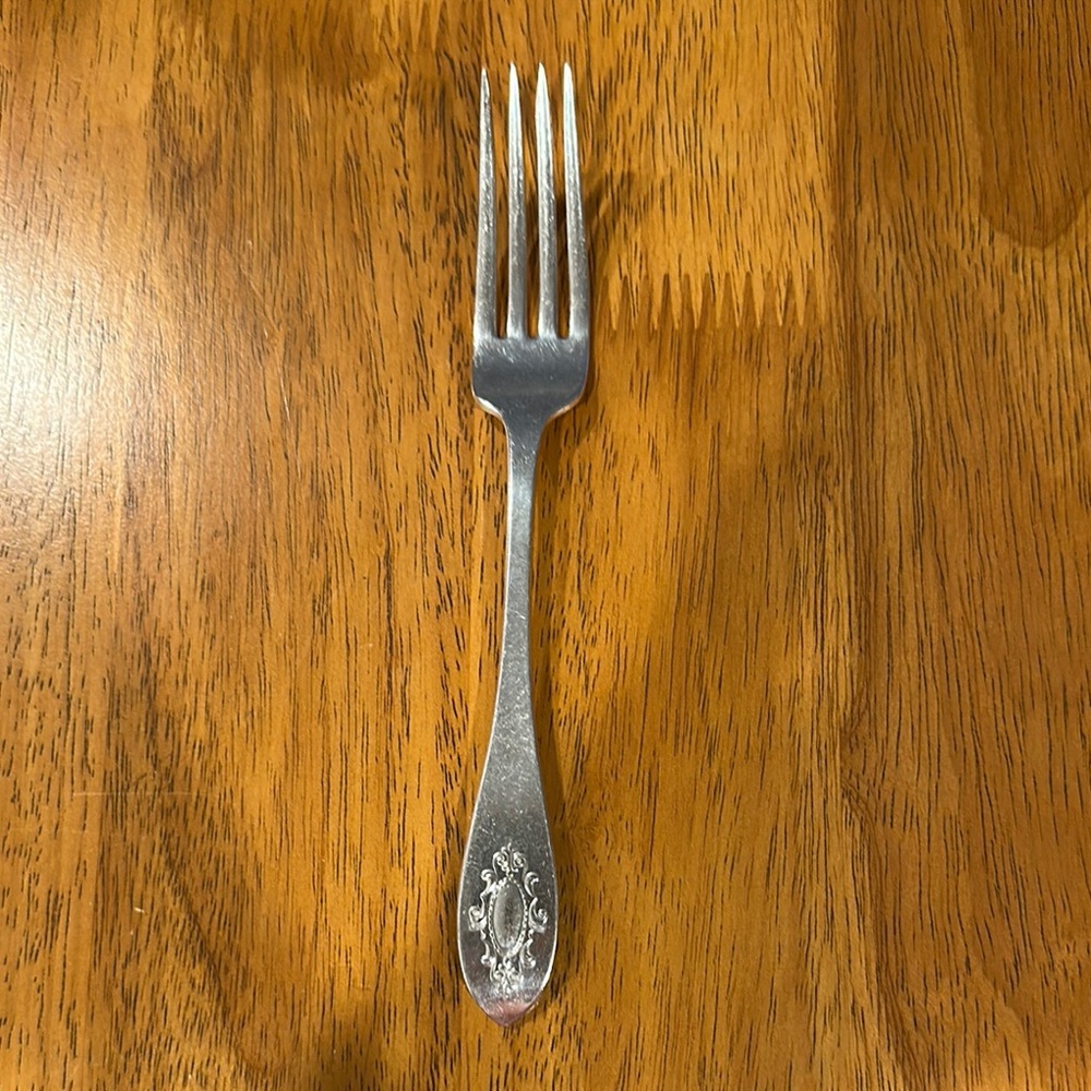 CV silver fork. No monogram. Have matching fork and spreader see pics